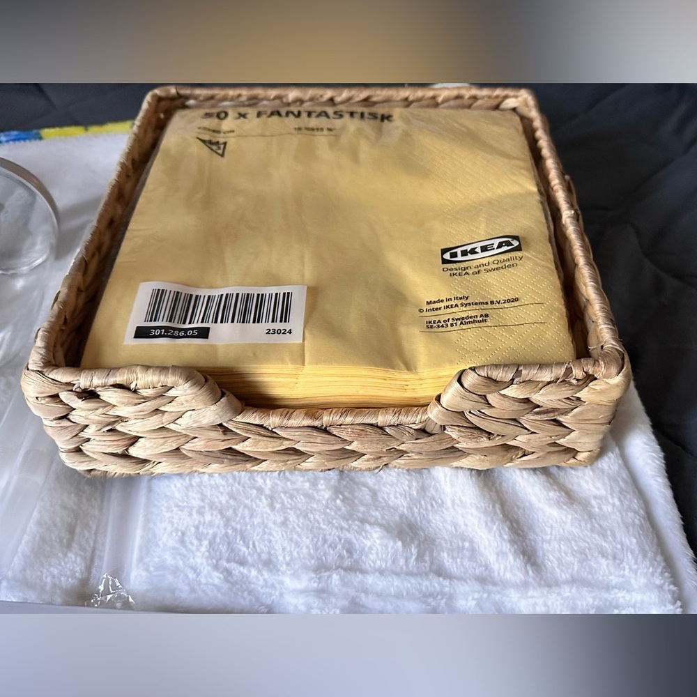 IKEA Water Hyacinth napkin holder 9x9”and new pack of yellow napkins 50 8x8”